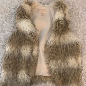 Faux fur vest.